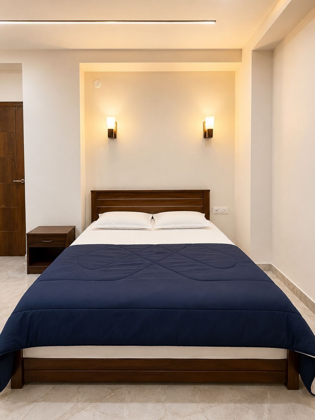 Living room with Smart TV at Ibiza Homestay Guwahati